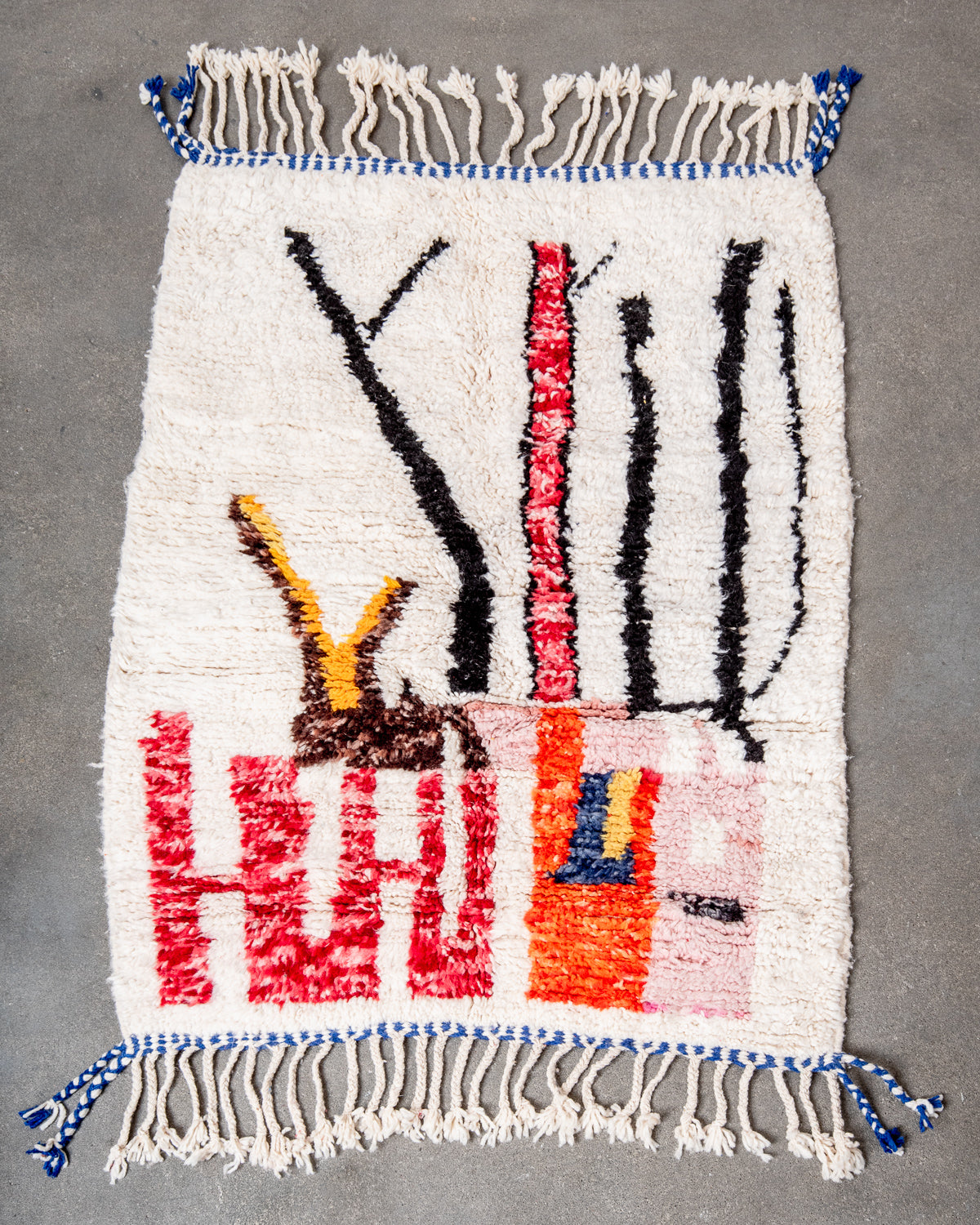 Modern, designer, handcrafted Berber rug from Morocco. Beniourain carpet with beautiful colours and patterns and fluffy wool texture.